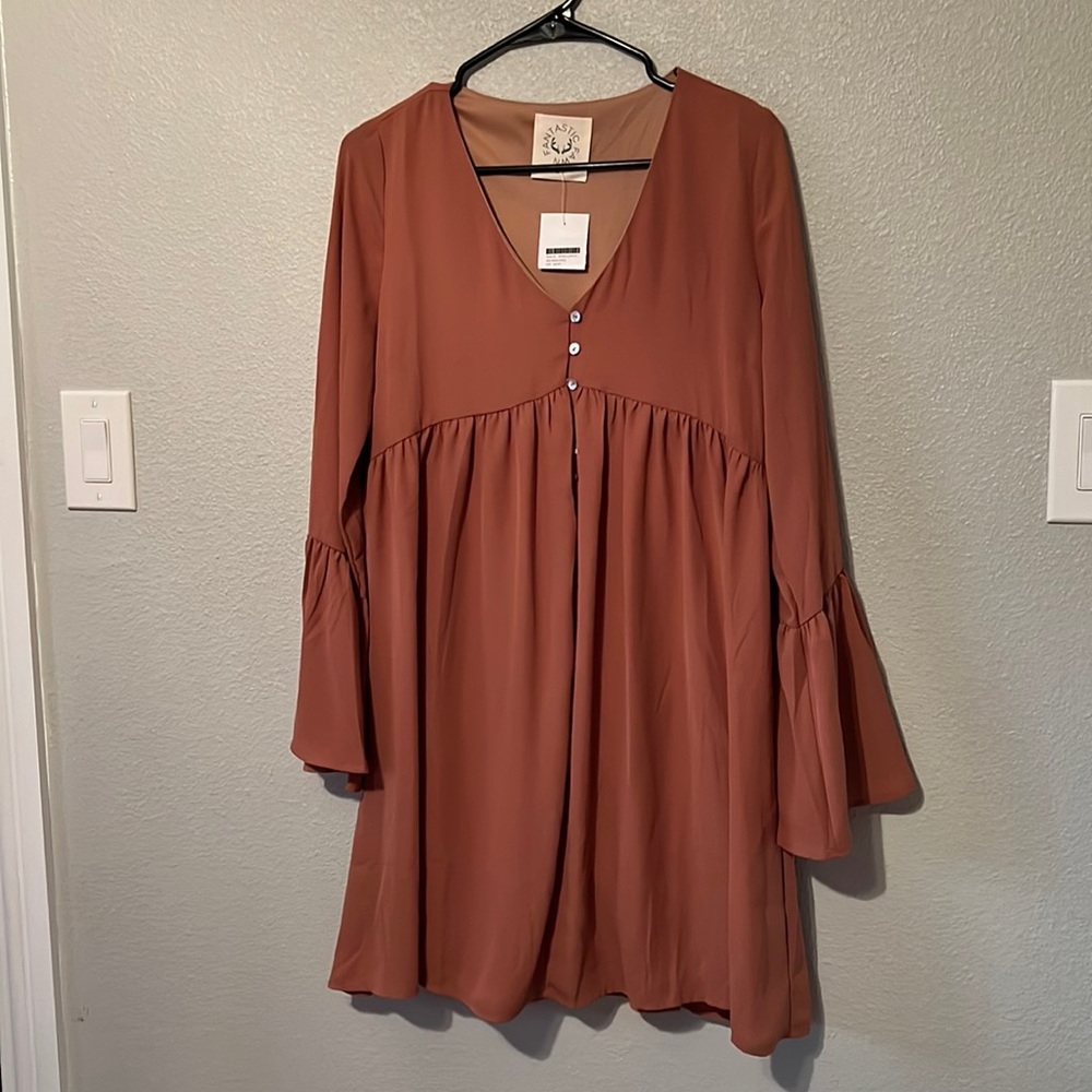 Lightweight bell sleeve dress. Brand new. Size women’s medium. Mauve color